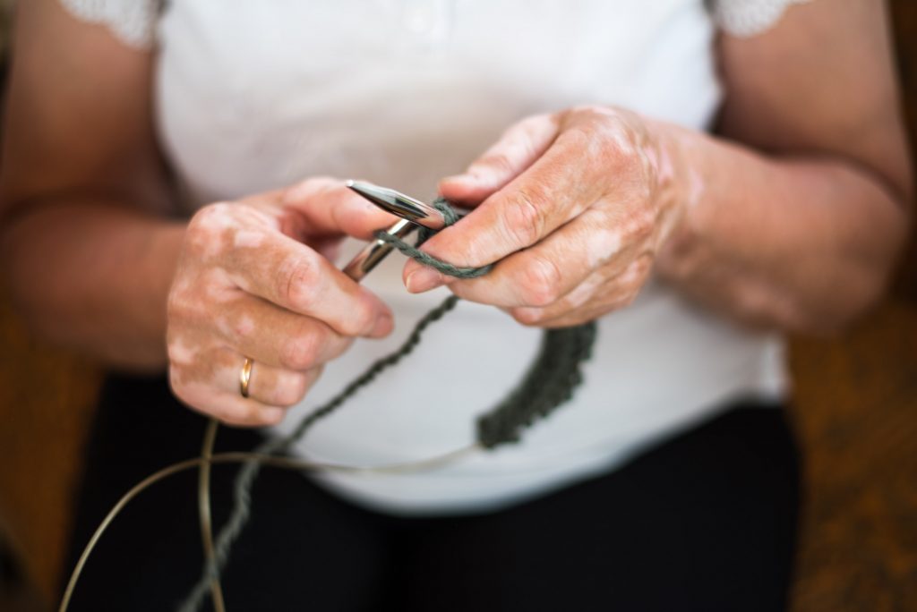 Women who knit sweaters and cardigans for The Knotty Ones