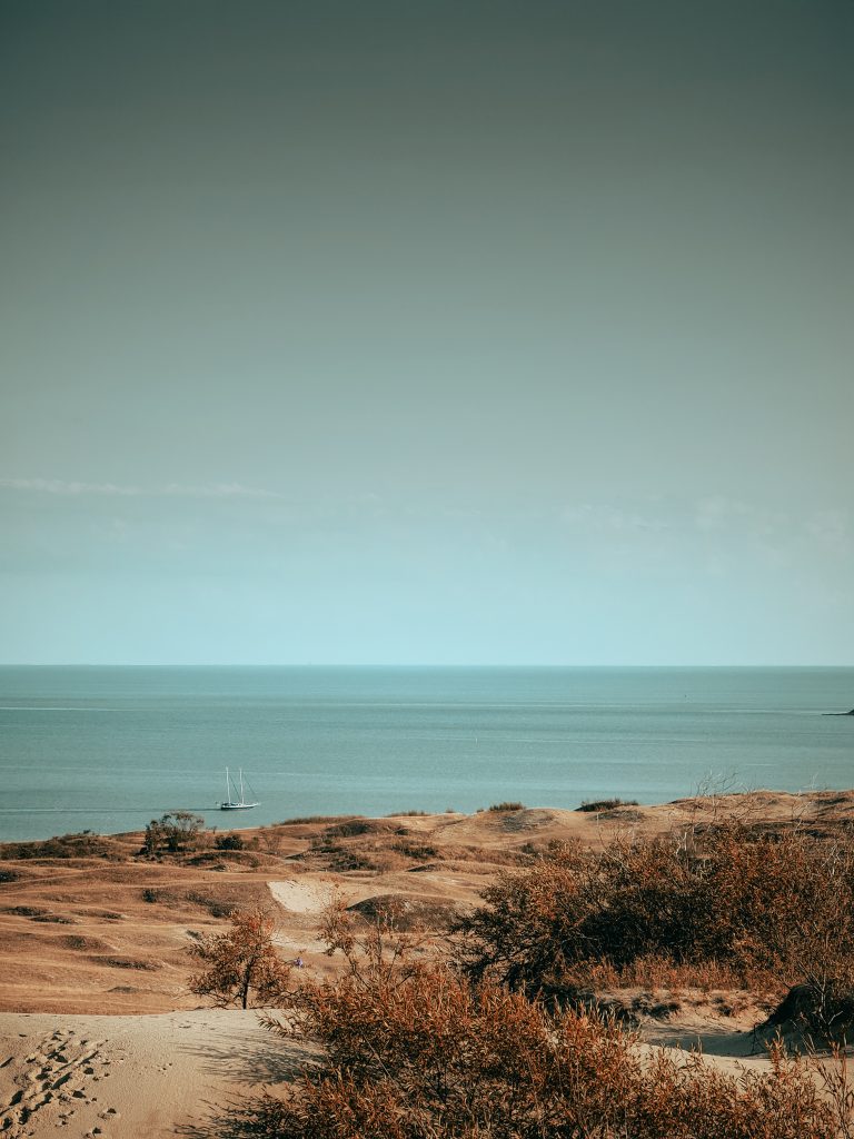 Nida panoramic lagoon view with a sailing boat